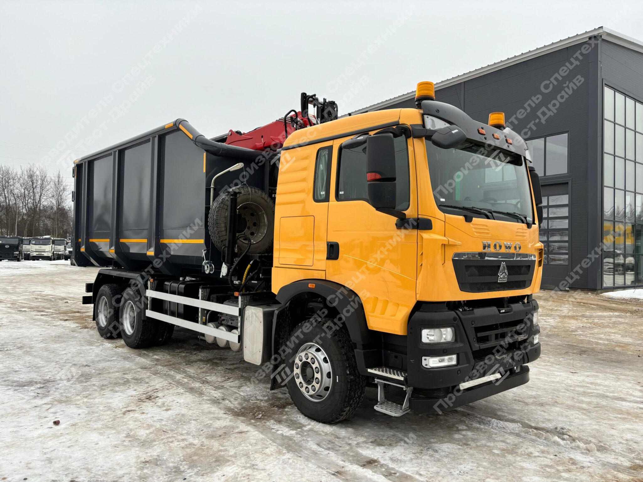 Ломовоз HOWO 6x4 с ГМУ Велмаш VM10L74M Фото №2