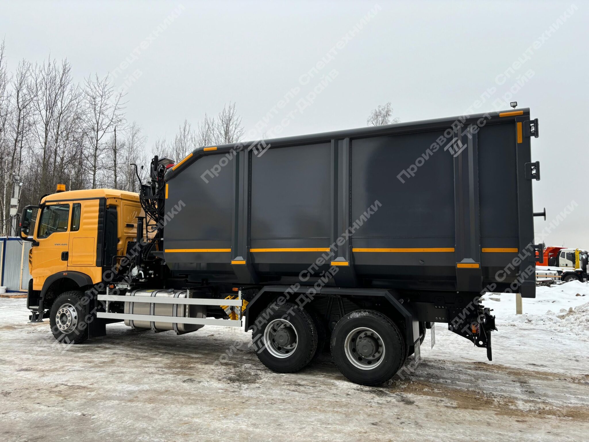 Ломовоз HOWO 6x4 с ГМУ Велмаш VM10L74M Фото №11