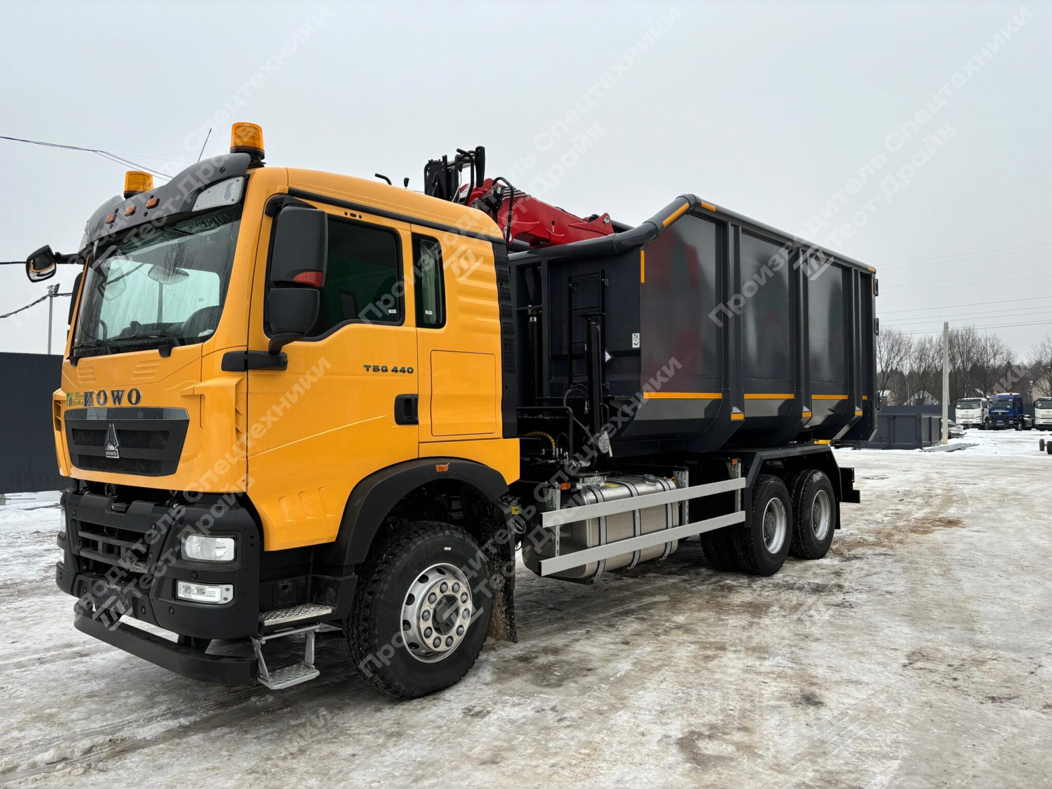 Ломовоз HOWO 6x4 с ГМУ Велмаш VM10L74M Фото №13