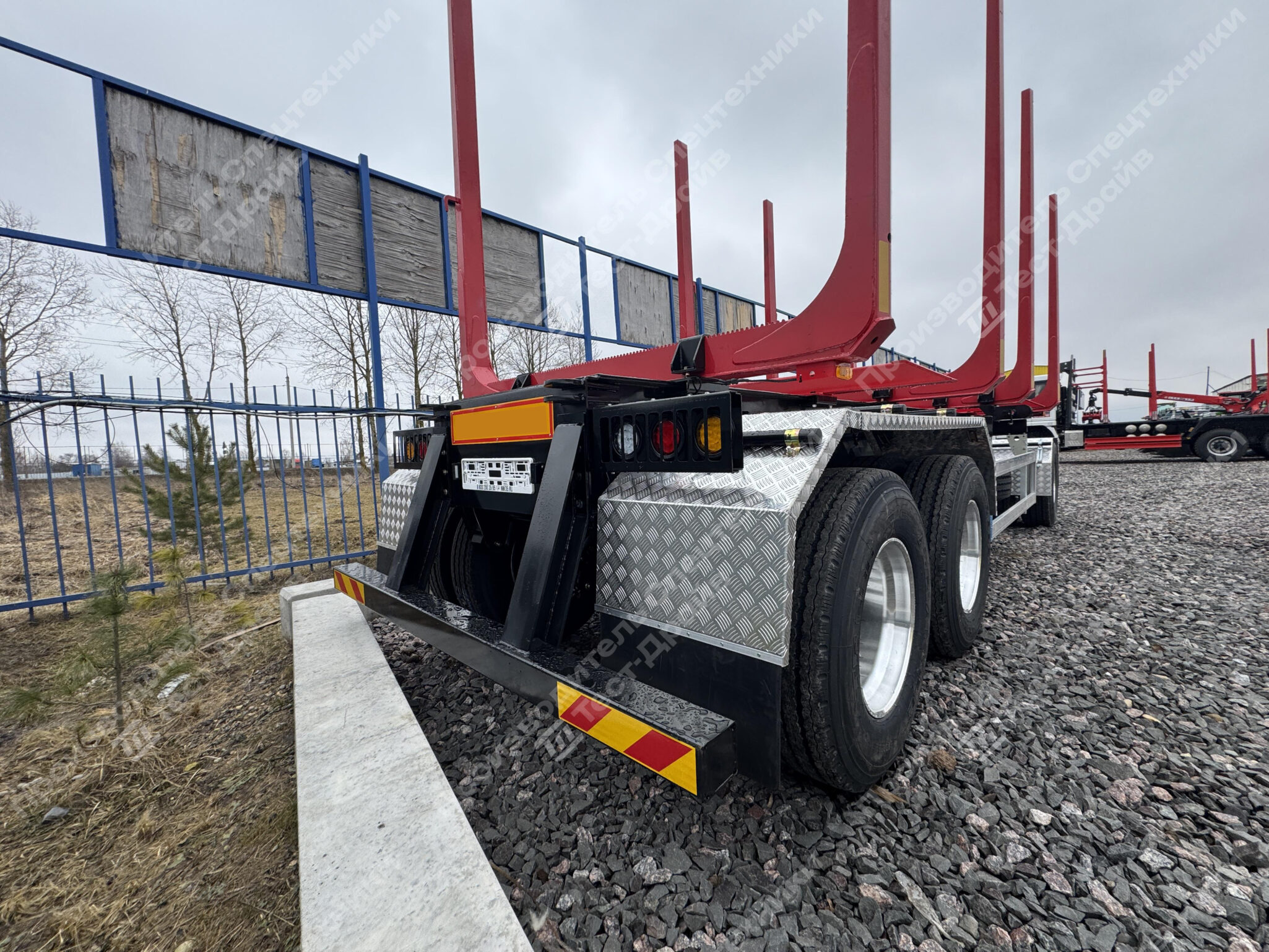 Прицеп сортиментовоз ТК ТД трехосный - 4 неразборных коника Фото №22