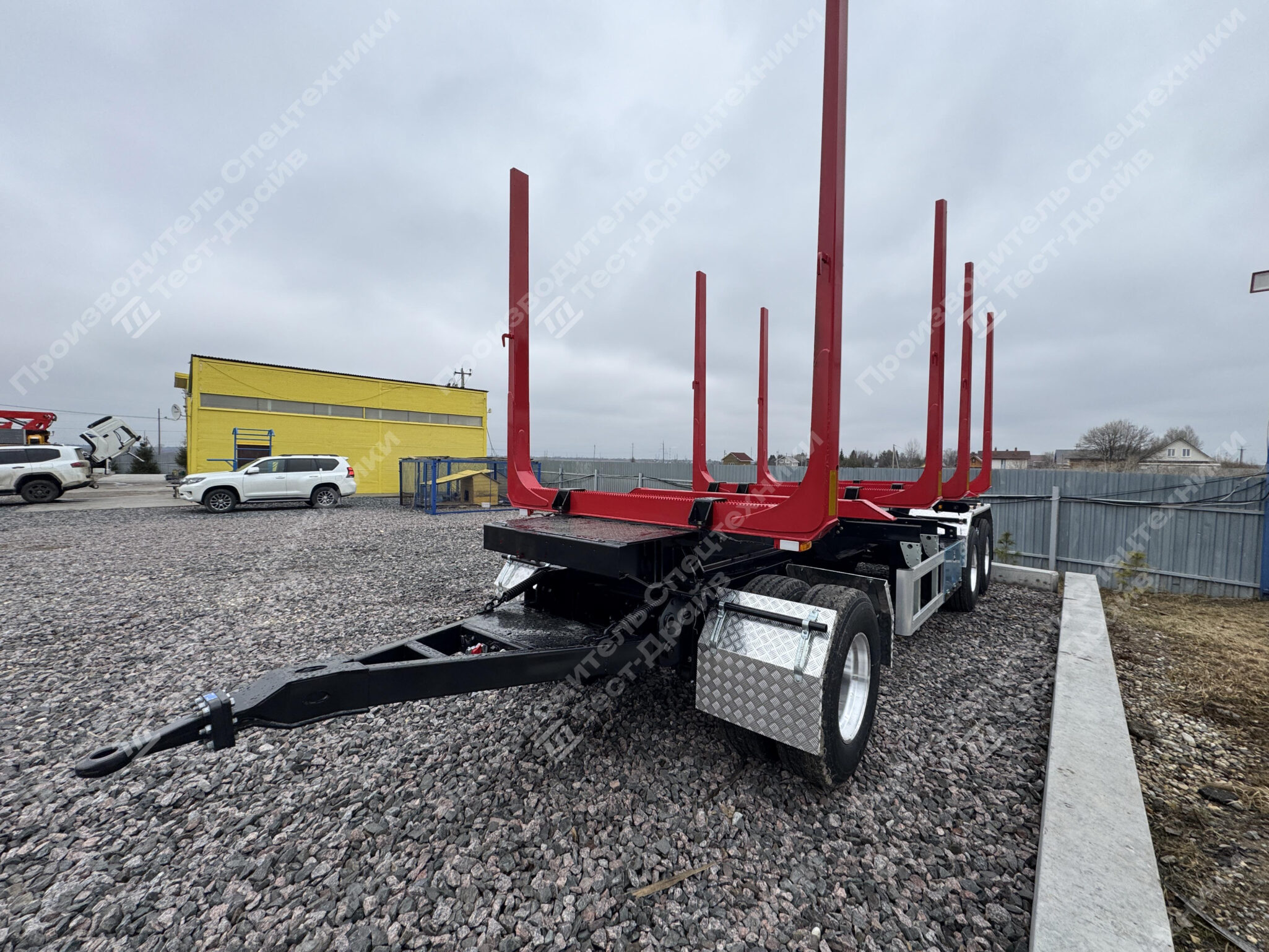 Прицеп сортиментовоз ТК ТД трехосный - 4 неразборных коника Фото №4