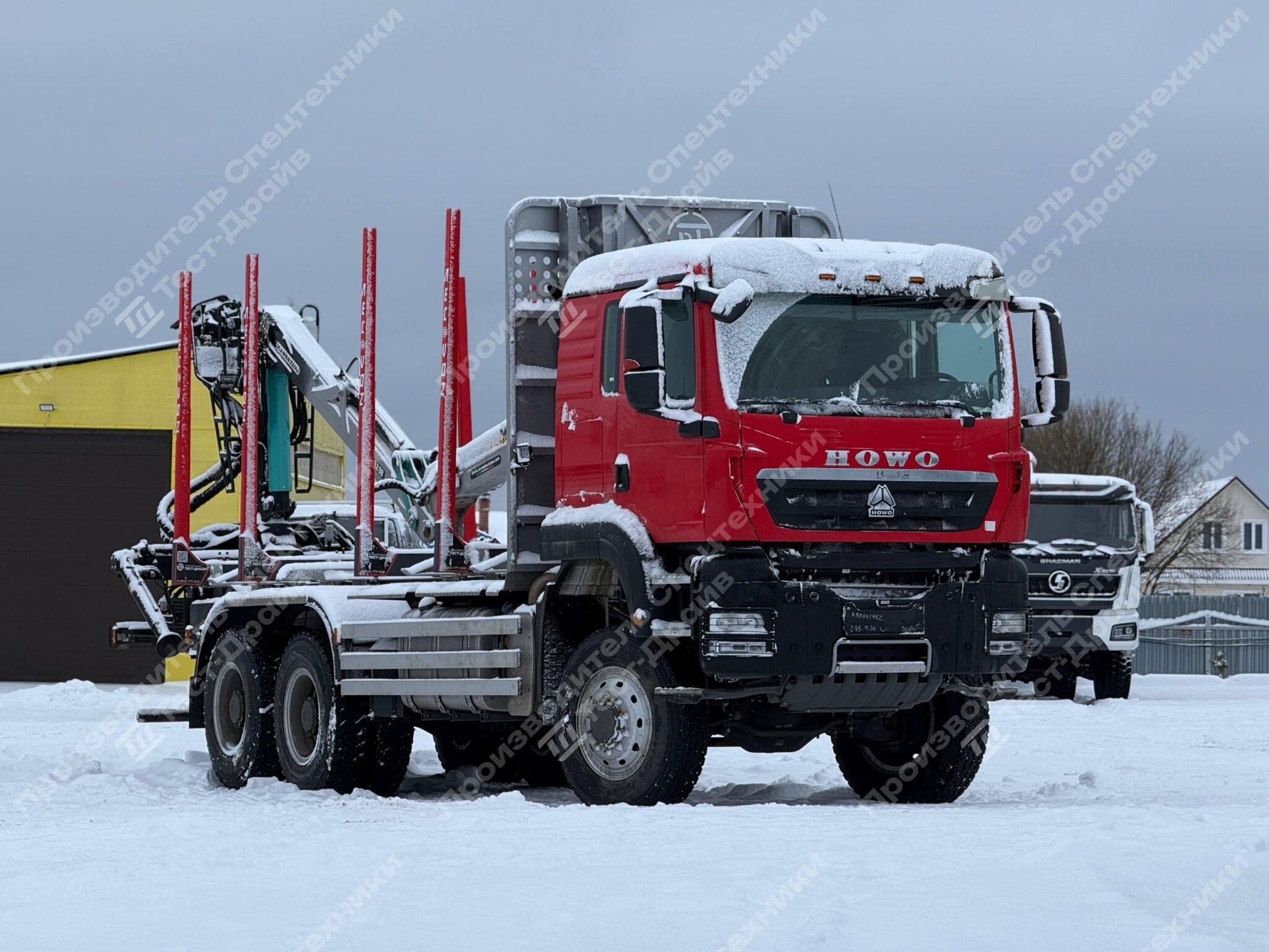 Сортиментовоз HOWO 6x6 с КМУ ICARBAZZOLI IB 100 L98 и площадкой ЛЕСОVOZ Фото №1