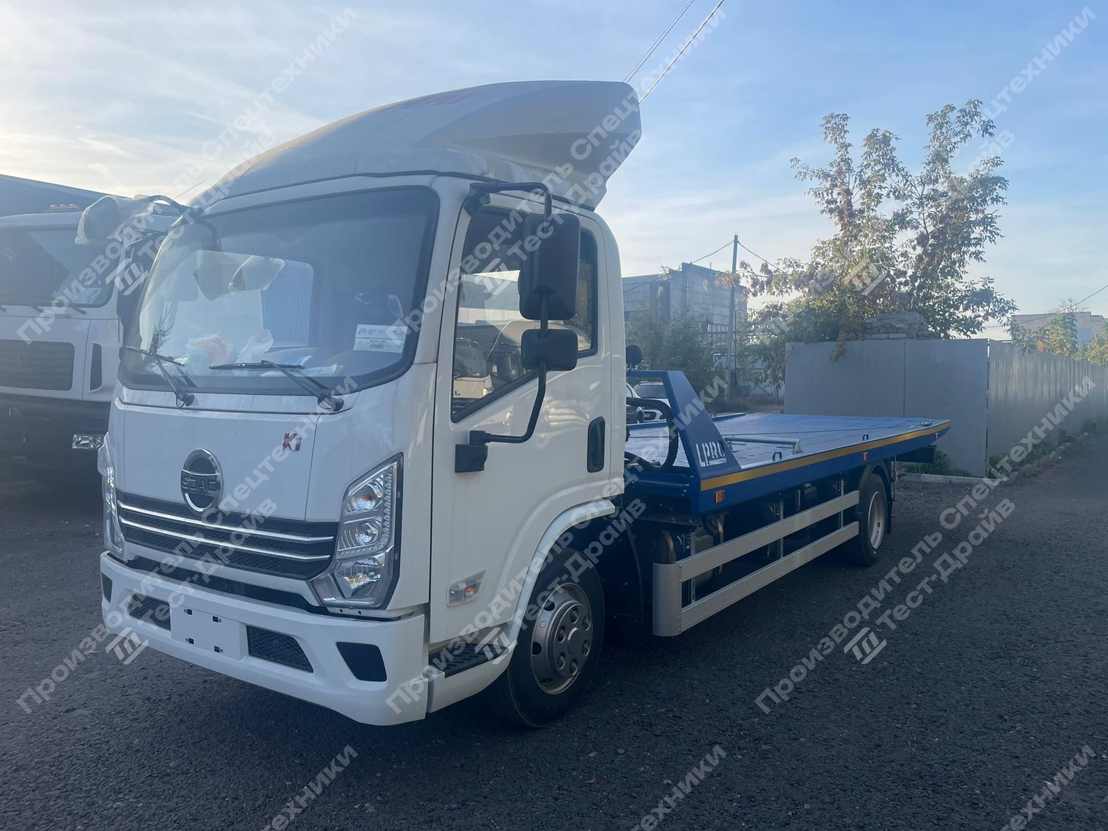 Эвакуатор SDAC YTQ1080KJ331 4x2 со сдвижной платформой Фото №4
