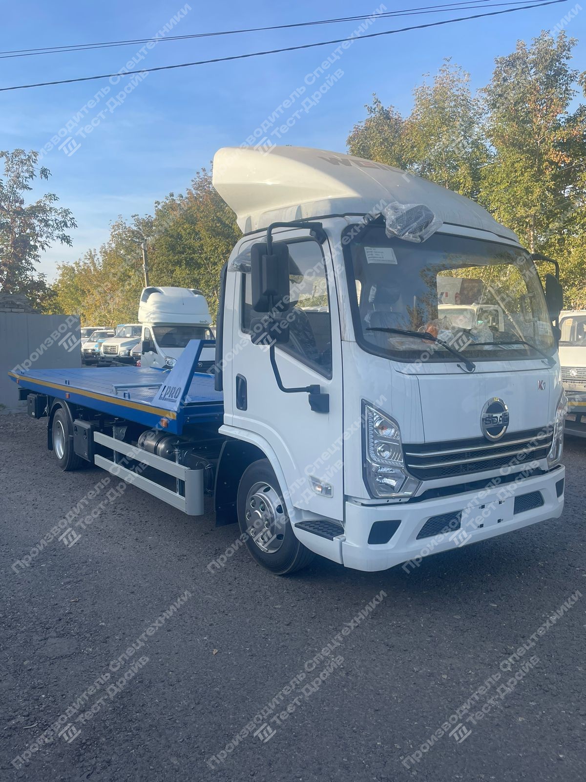 Эвакуатор SDAC YTQ1080KJ331 4x2 со сдвижной платформой Фото №6