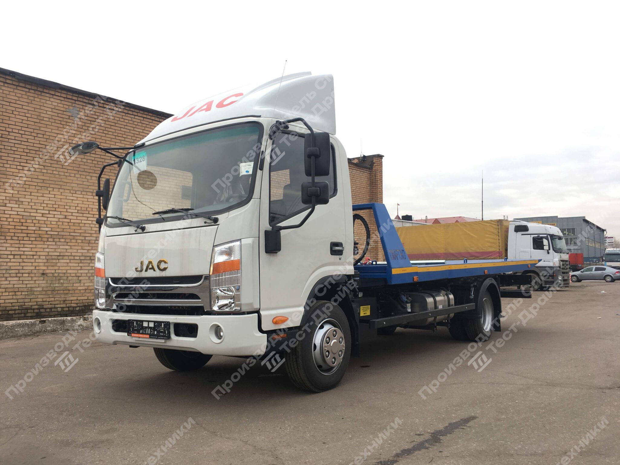 Эвакуатор со сдвижной платформой JAC N90 4x2 Фото №2