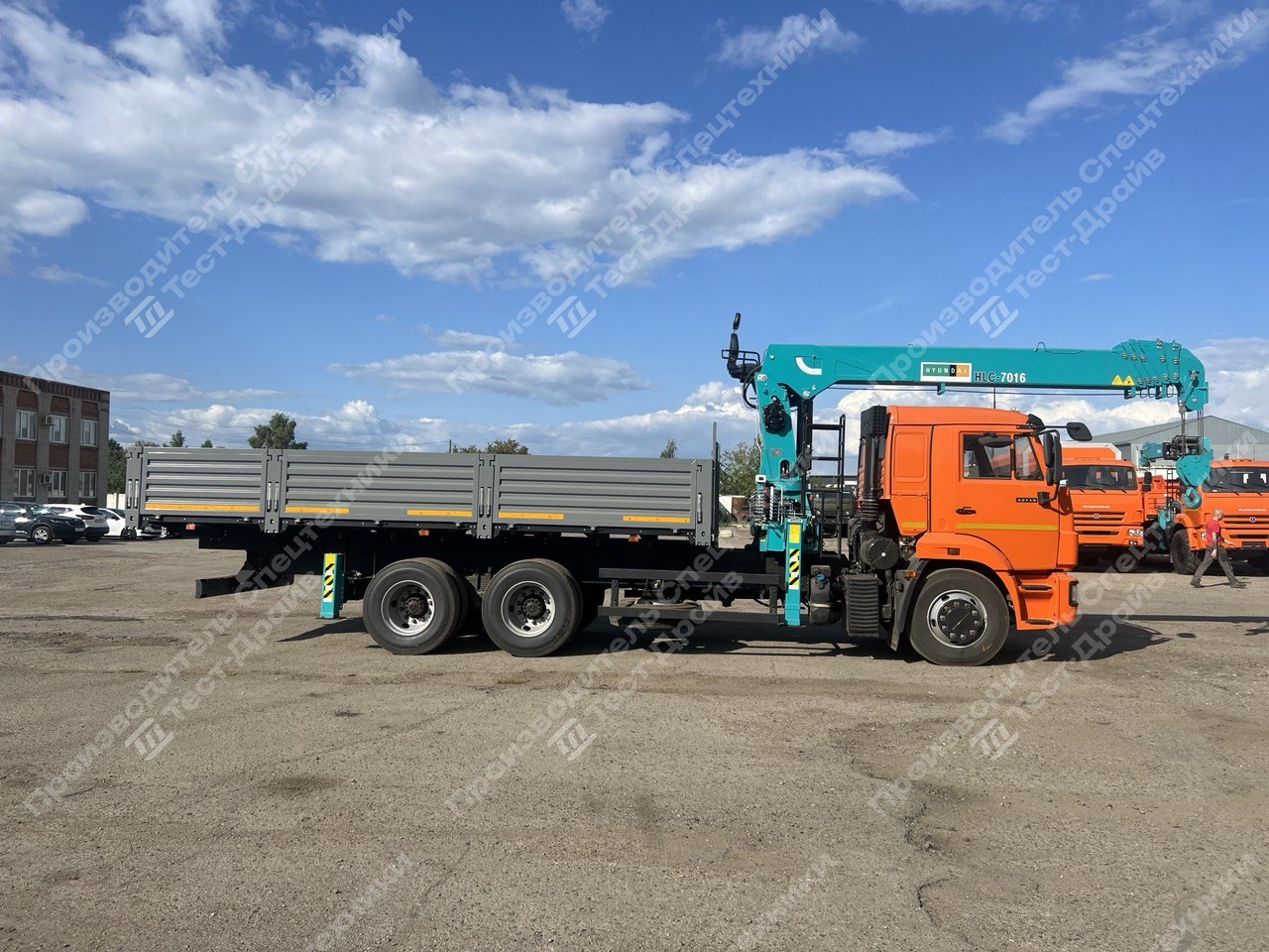 Бортовой КамАЗ-65115-48 6x4 с КМУ HKTC HLC 7016 Фото №1