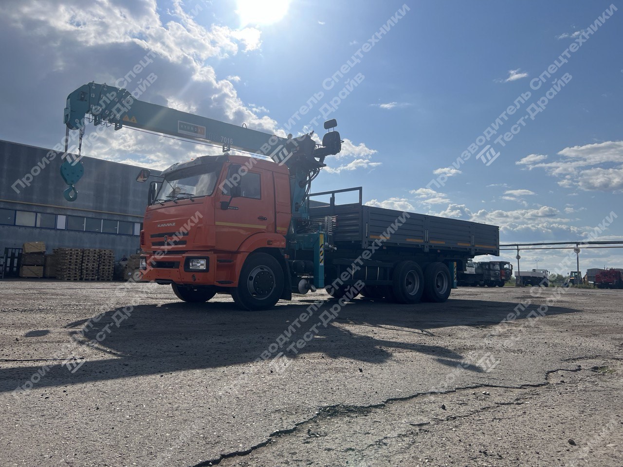 Бортовой КамАЗ-65115-48 6x4 с КМУ HKTC HLC 7016 Фото №10
